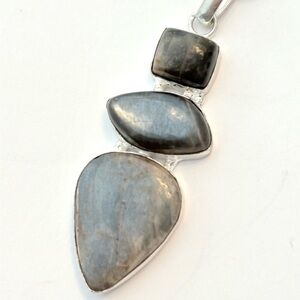 2 1/2 inch rare, 3 stone, Chocolate Moonstone pendant on a silver chain.
